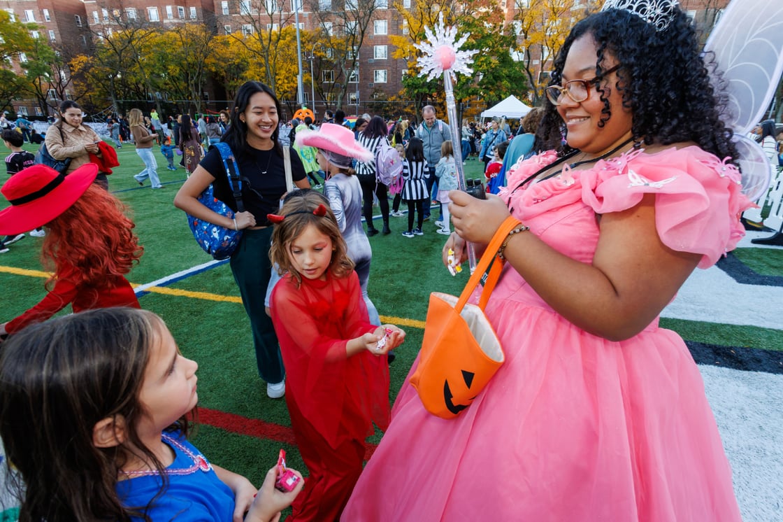 Volunteer interacting with kids at Asphalt Screams