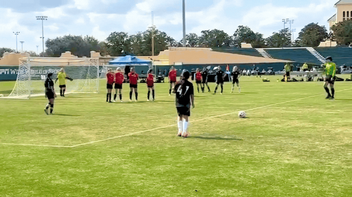 A gif of Asphalt Green Soccer Club players competing at soccer game 